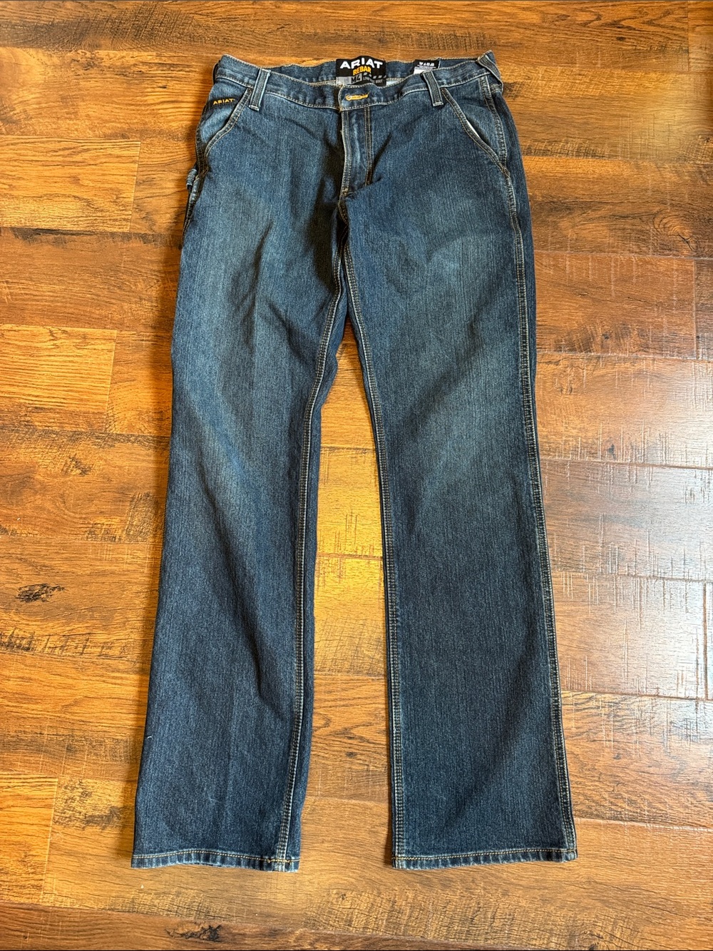 Men’s size 34W 36L ARIAT brand M4 Low Rise Boot Cut Jeans.